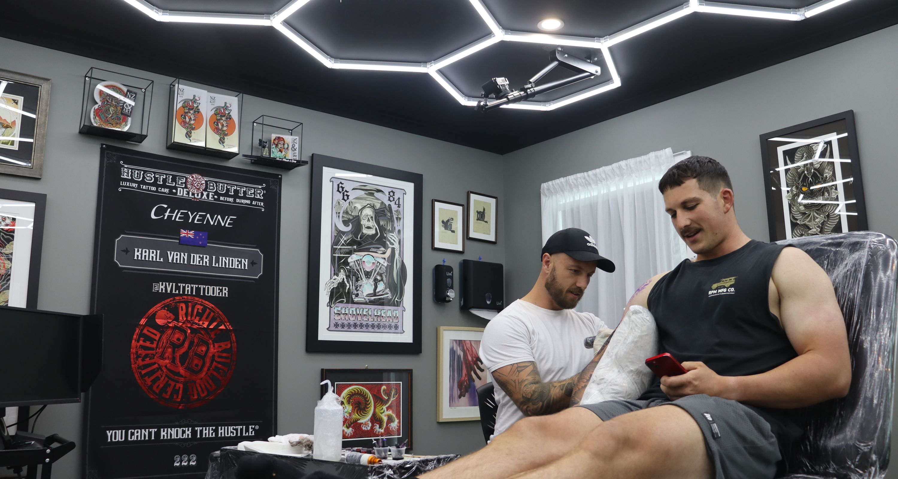 Karl tattooing client